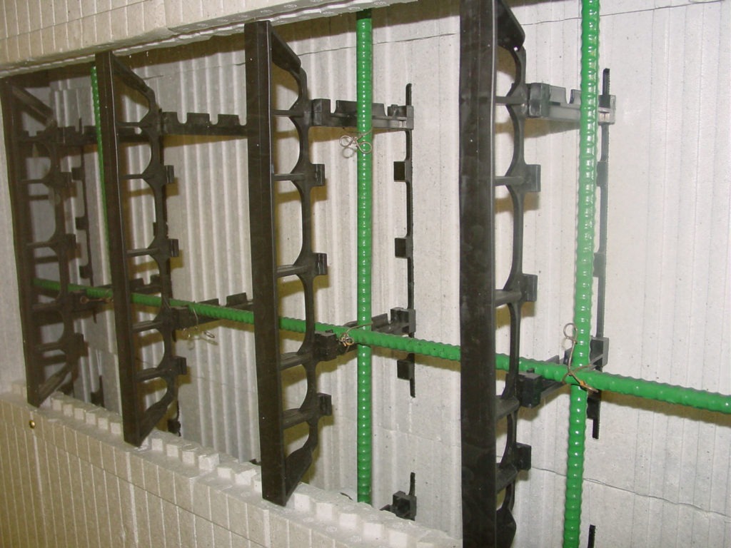 a concrete wall taken out to reveal the interlocking units