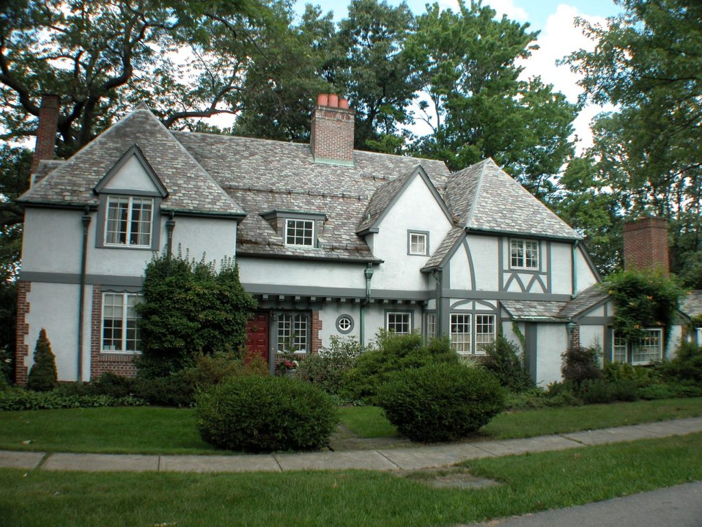A two-story, Tudor-style home”