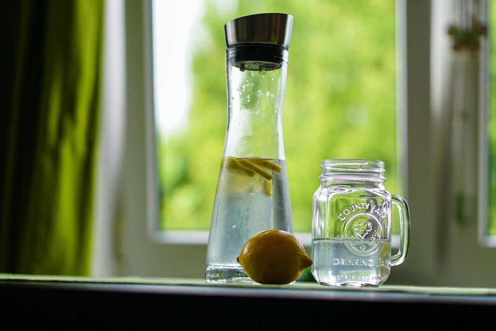 Water in a bottle and glass mug