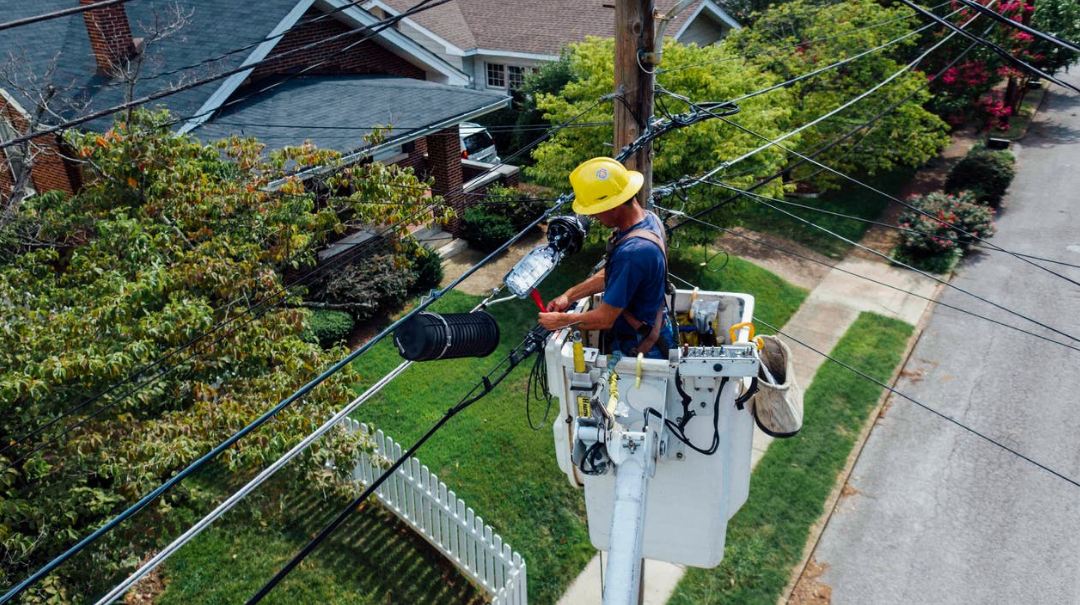 an electrician fixing electrical wires