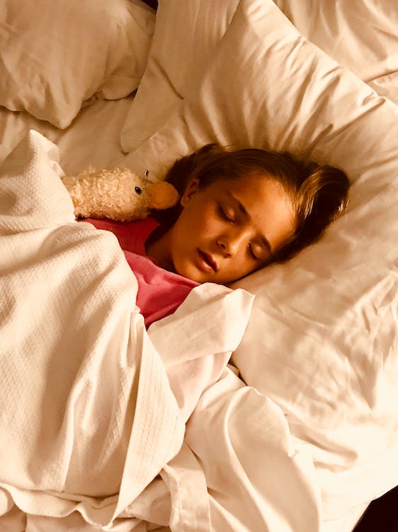 When can toddler sleep with blanket and pillow
