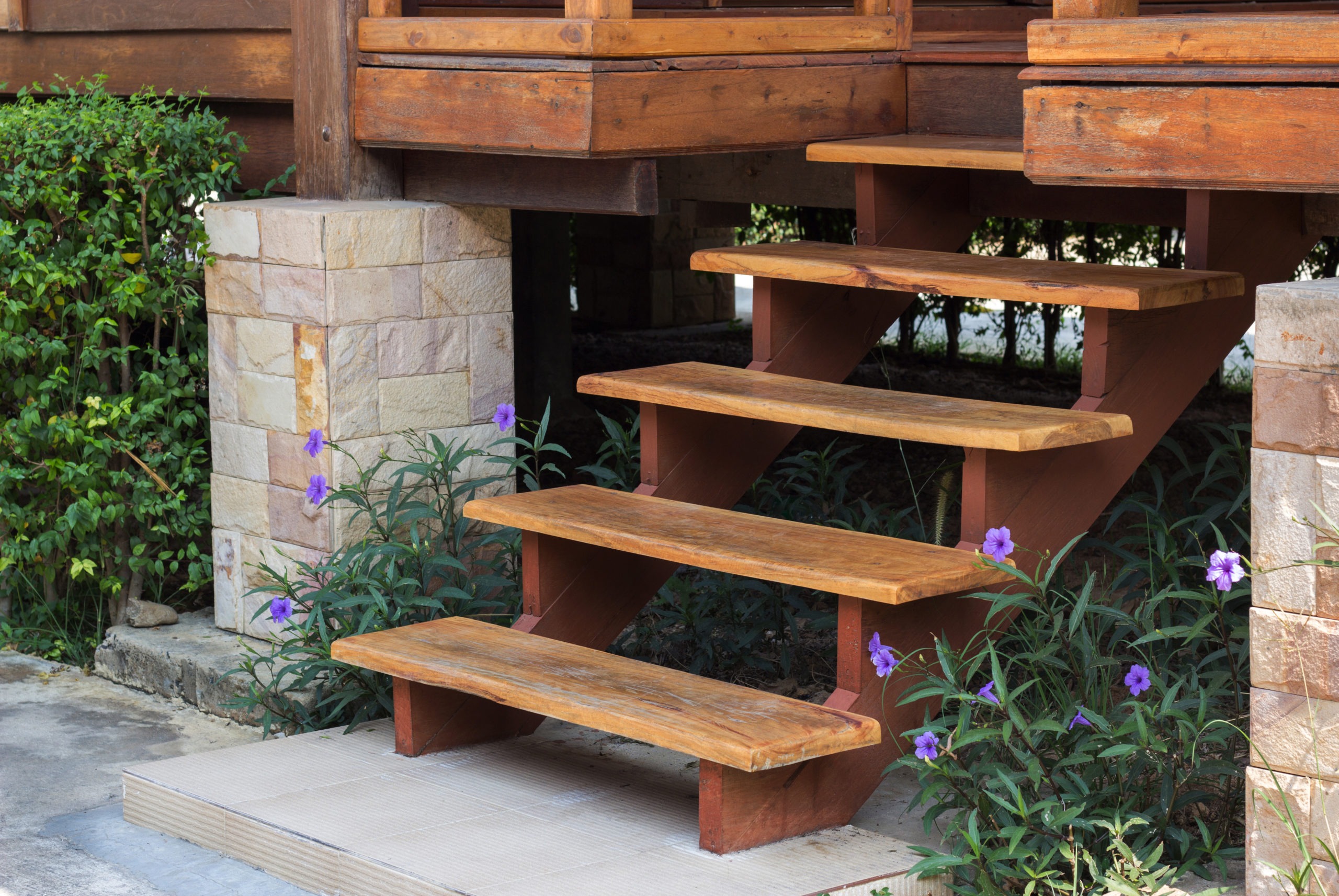 Exterior wooden stairs to house entrance