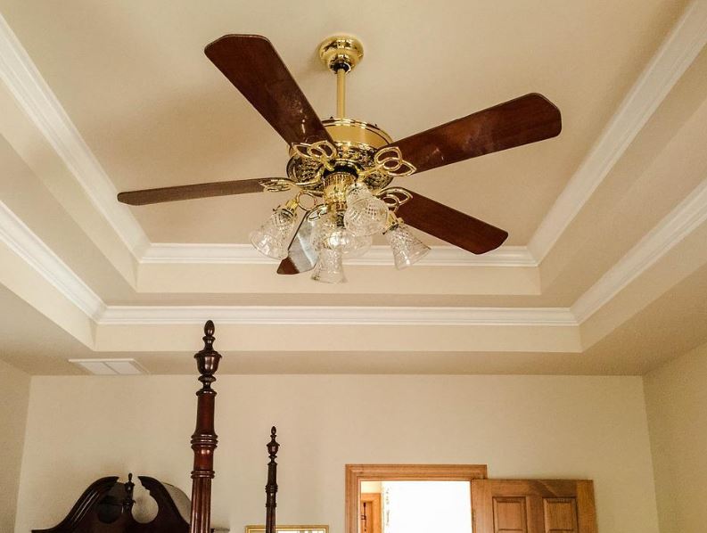 a ceiling fan on a ceiling