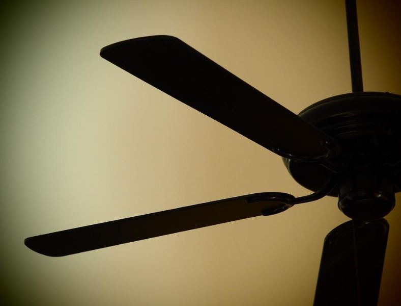 a close up of a ceiling fan’s blades