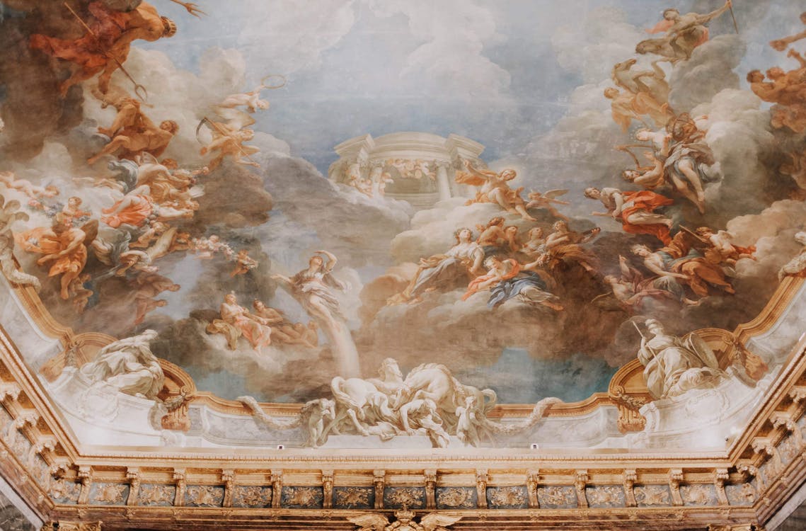 a painting of angels on the ceiling