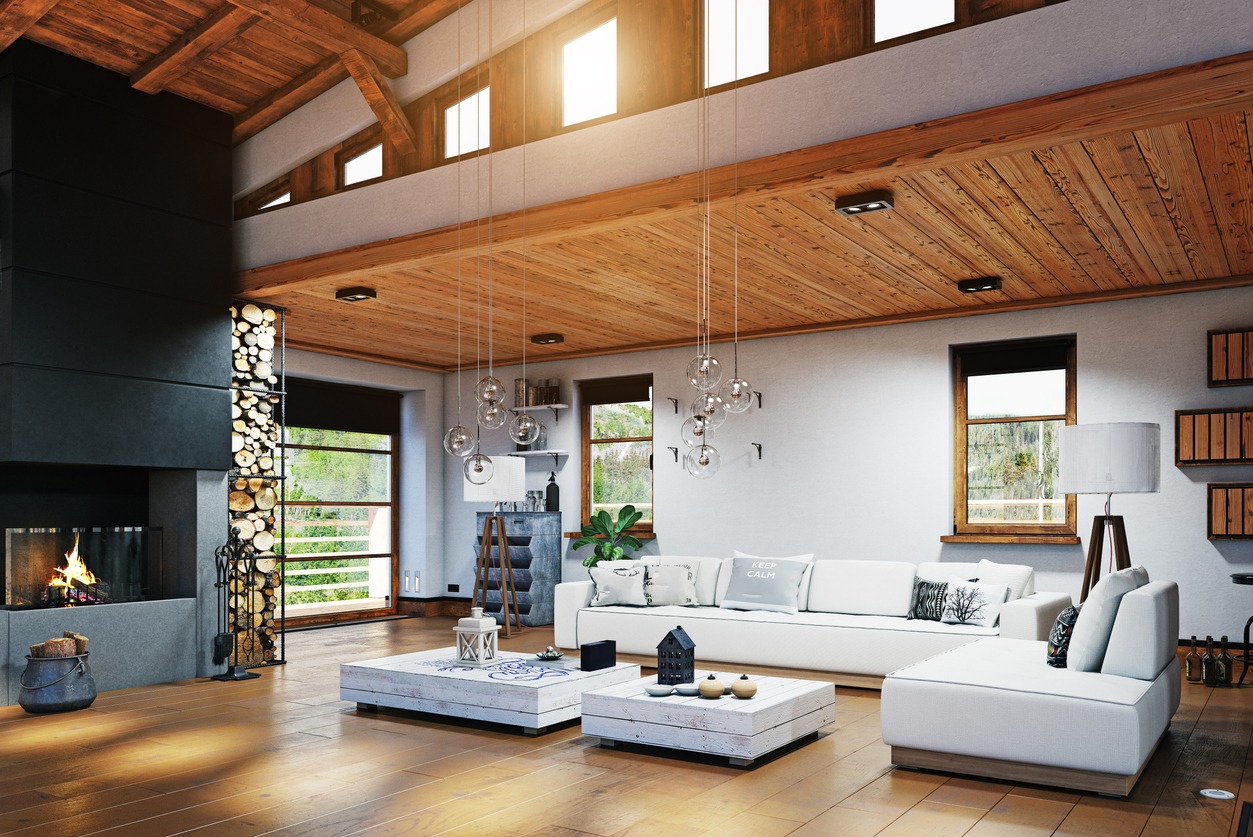 a beautiful living room with planked wood ceiling design