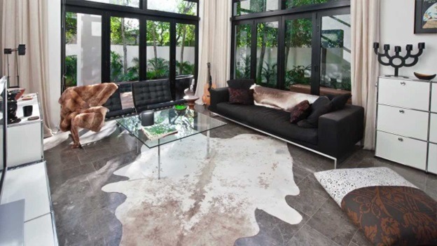 Cowhide Rugs Are A Great Choice For Layered Decor
