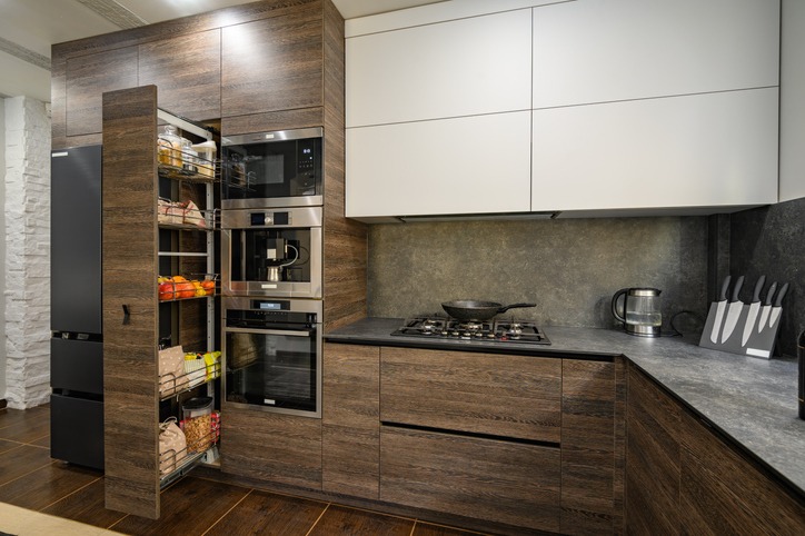 Modern luxury large dark brown, gray and black kitchen details