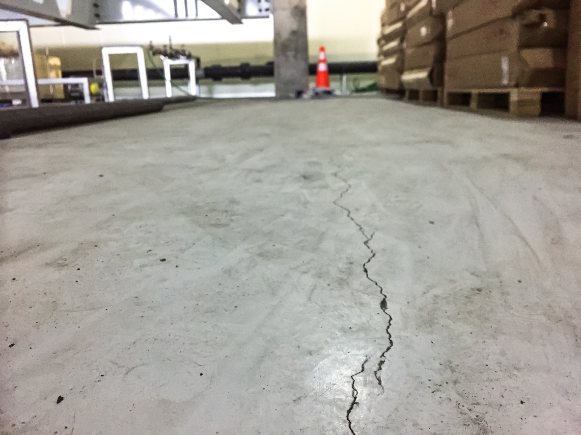 Cracked floor at factory,dilapidated building,broken floor,Grunge surface with cracked cement