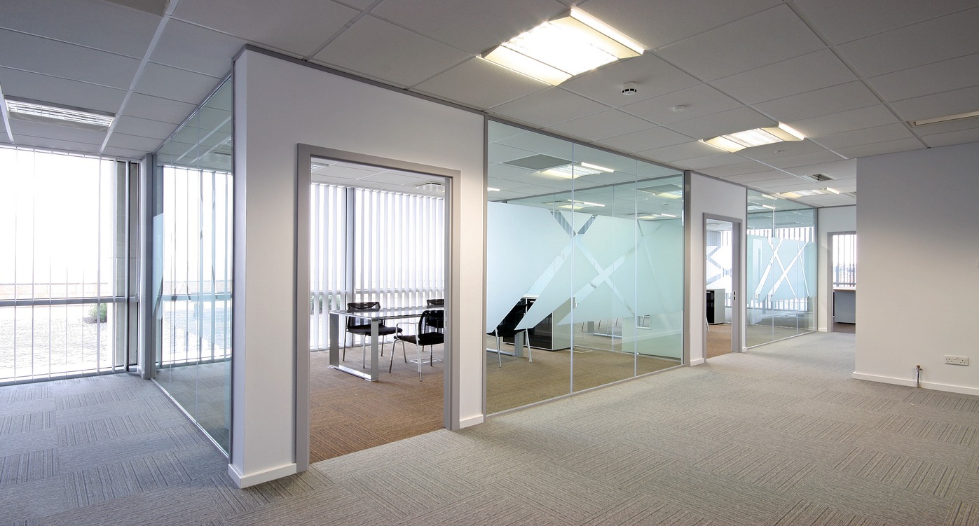 an office space with acoustic ceiling tiles