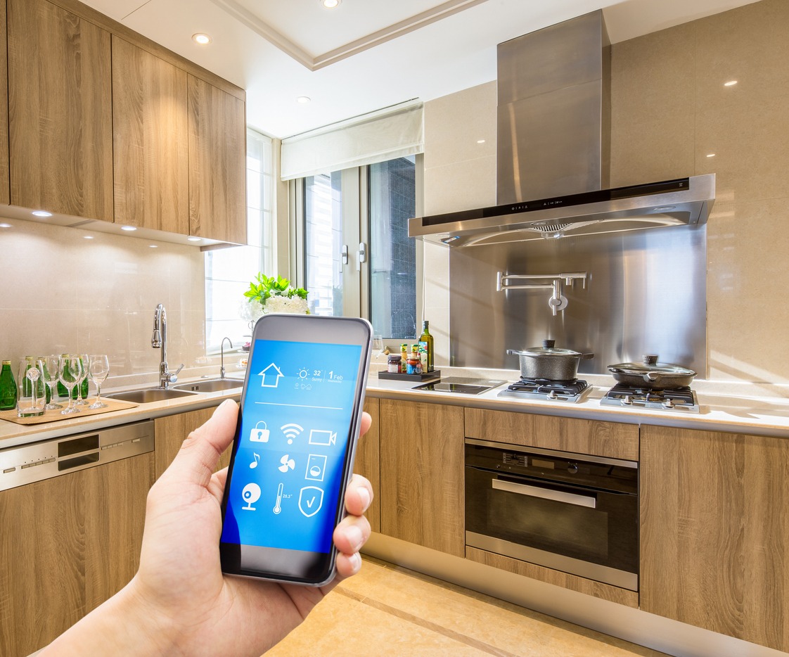 phone with smart home app in the kitchen
