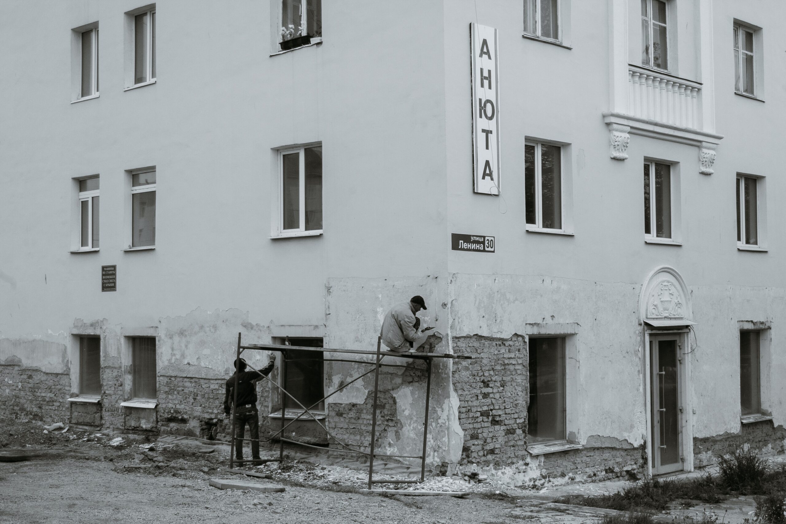 Men constructing a residential house