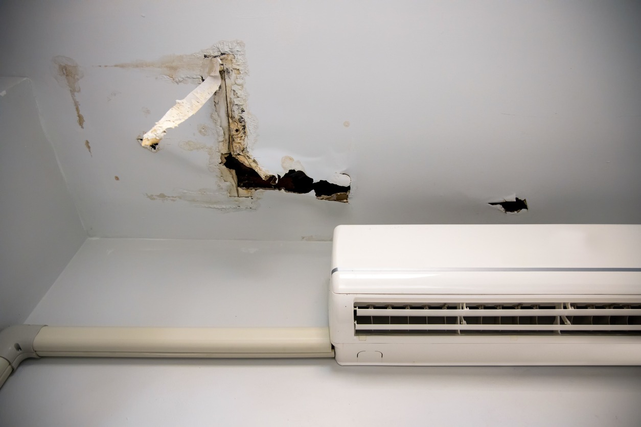 a damaged hole in the roof due to vent damages