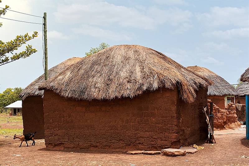 clay houses with straw roofing