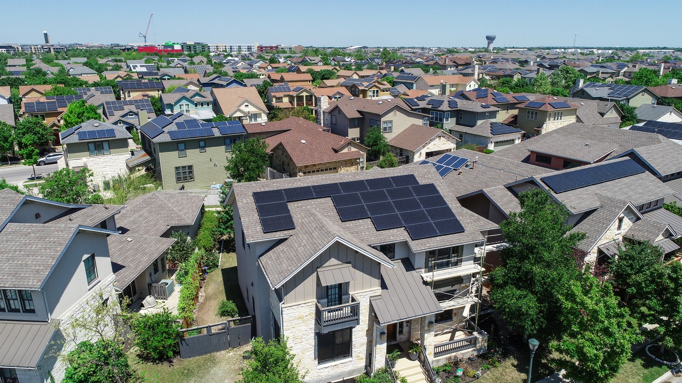 suburbs with solar panel roofs