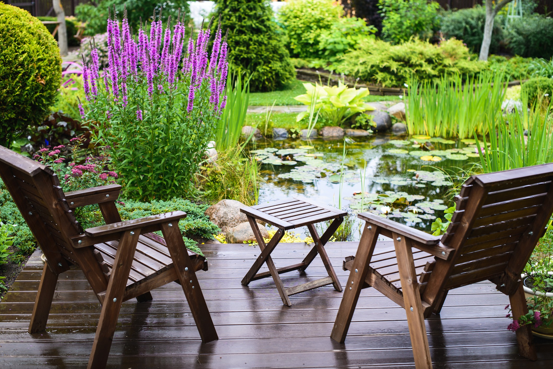 Deck and garden furniture near the pond 