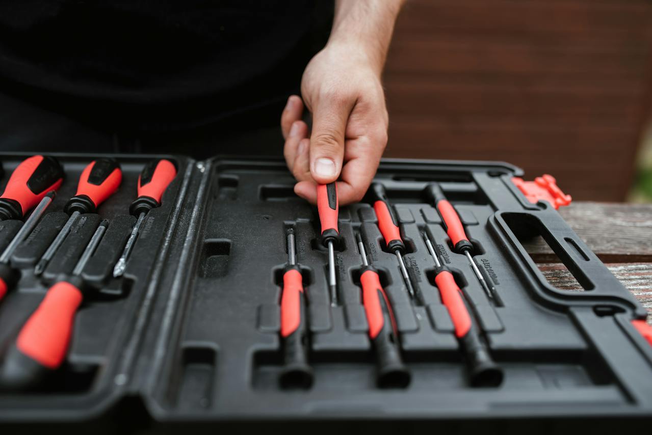 a handyman with a set of screwdrivers