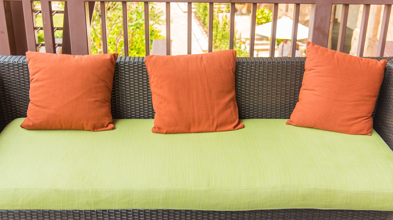 deck couch with colorful cushions